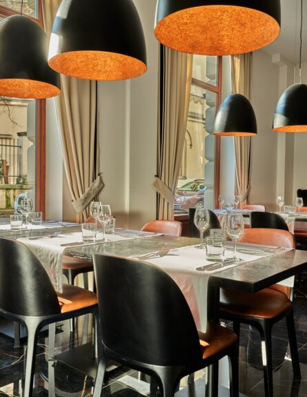 Atmospheric interior of Garni Hotel’s restaurant, perfect for a romantic dinner