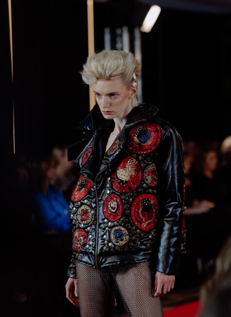 Fashion show – model in Adrian Lewandowski’s designer jacket