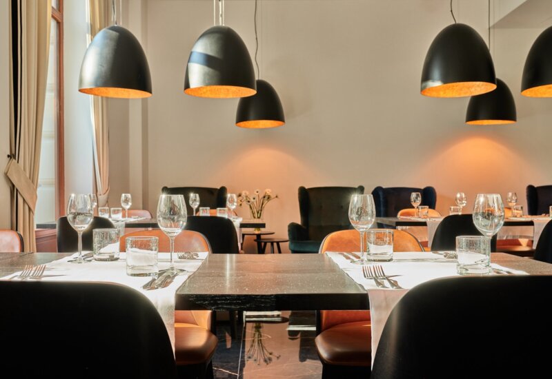 Interior of Garnish Restaurant with warm colors and elegant decor