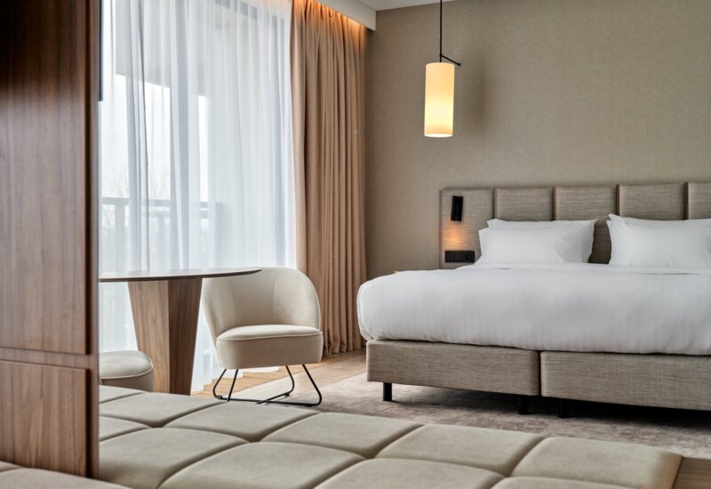 Double room in an elegant hotel in Kraków, with panoramic windows and a view of the Kraków Błonia