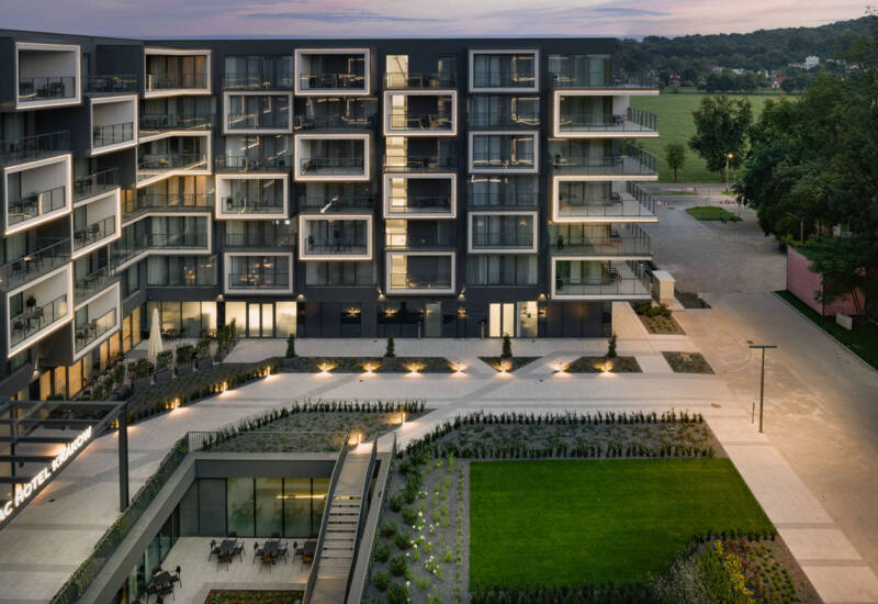 Aerial shot of the AC Hotel building in Kraków with a view of the surrounding area