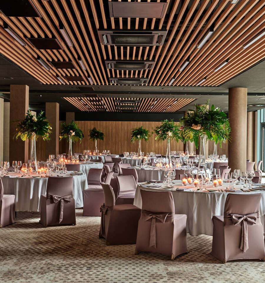 Special event in a modern space – minimalist decorations, stylish tables, and sophisticated interior