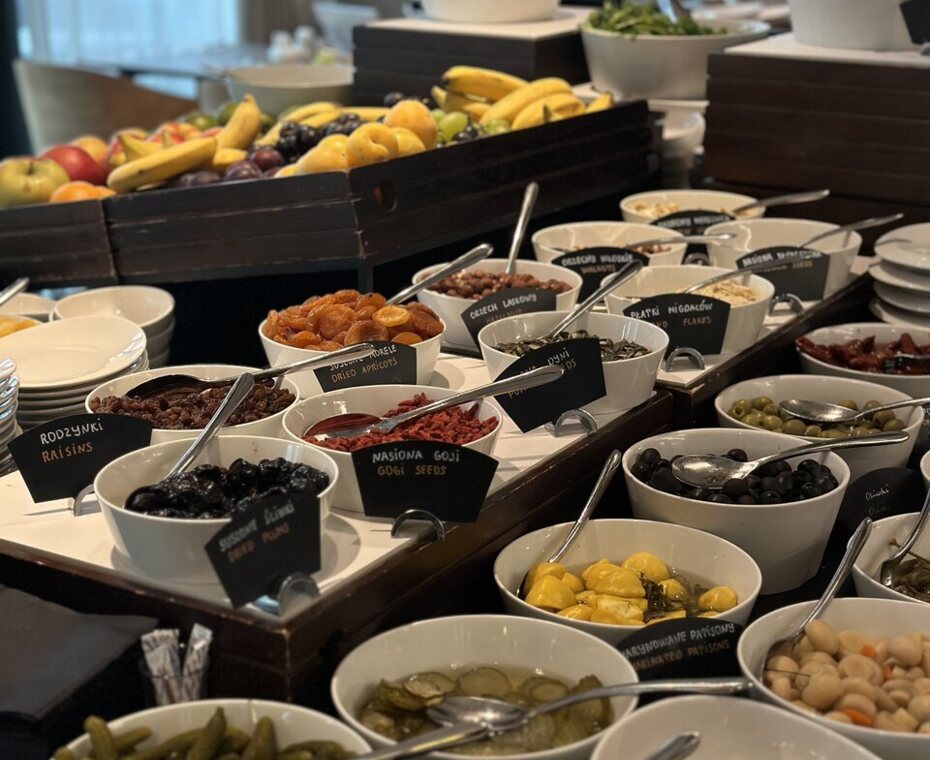 Hotel buffet breakfast – a wide selection of hot and cold dishes in an elegant hotel in Kraków.