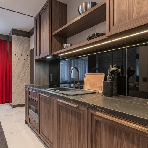 View of a dark kichenette.