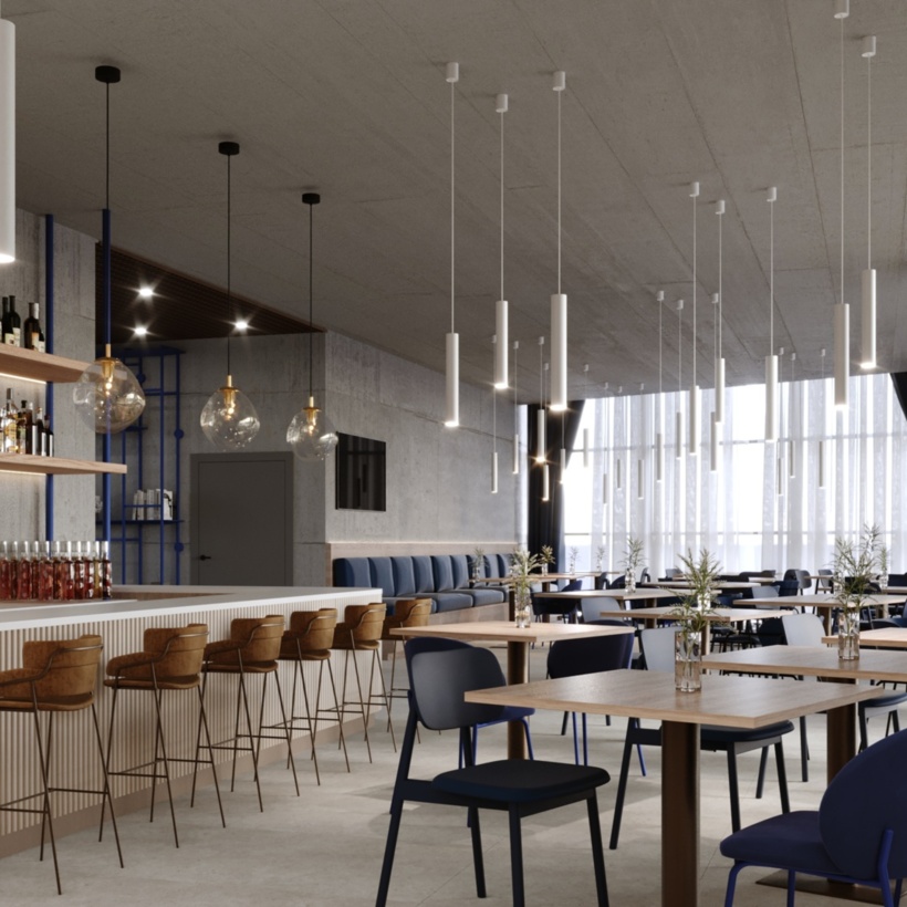 Elegancka hotelowa restauracja z jasnym oświetleniem i dużym oknem widokowym