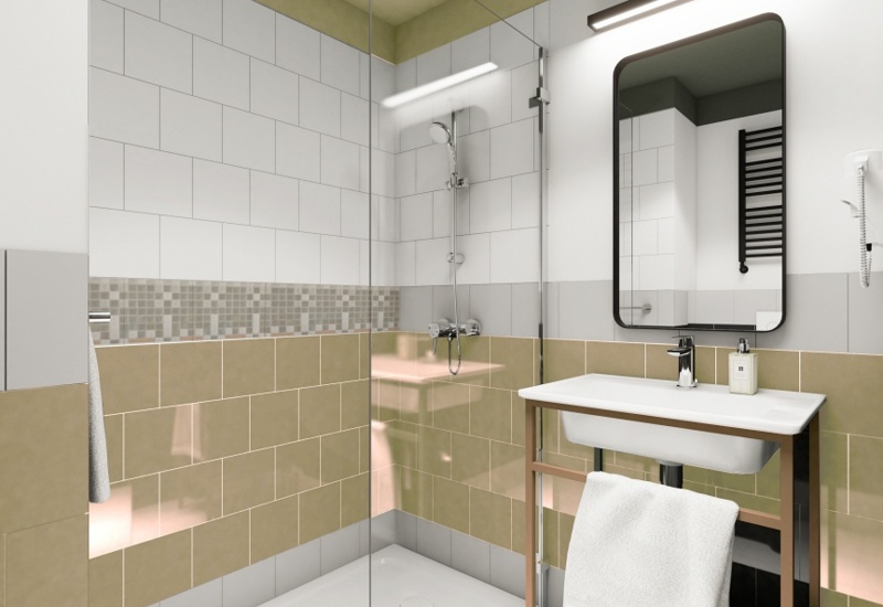 Walk-in shower with glass screen, white and beige tiles, modern sink and vanity with towel, illuminated mirror and wall hairdryer