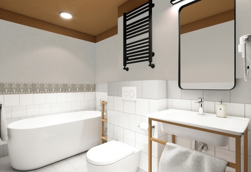 Modern hotel bathroom with freestanding tub, wall-mounted toilet, illuminated mirror, wooden sink stand with towel, heated towel rack, recessed lights