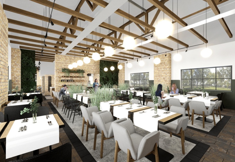 Bright farmhouse-style dining room with exposed wooden beams, brick walls, globe pendant lights, greenery and upholstered tables; guests dining.