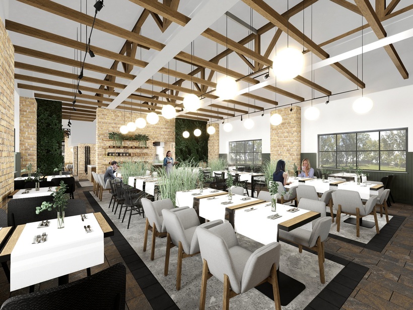 Bright farmhouse-style dining room with exposed wooden beams, brick walls, globe pendant lights, greenery and upholstered tables; guests dining.