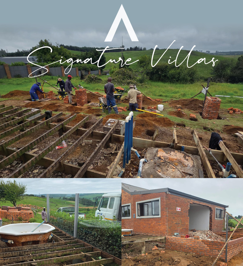Workers building brick pillars and timber deck for villa renovation with a sunken hot tub and rolling green countryside views