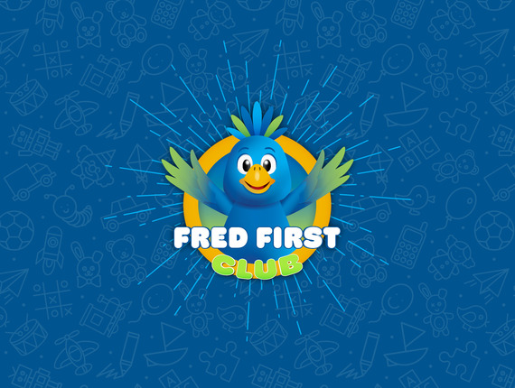 Playful blue bird mascot with outstretched wings inside yellow ring, 'FRED FIRST CLUB' logo over toy-patterned blue background.