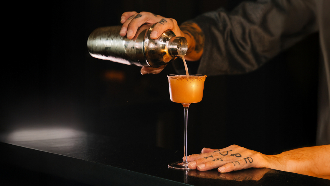 A cocktail being prepared at Chatrium Grand Bangkok