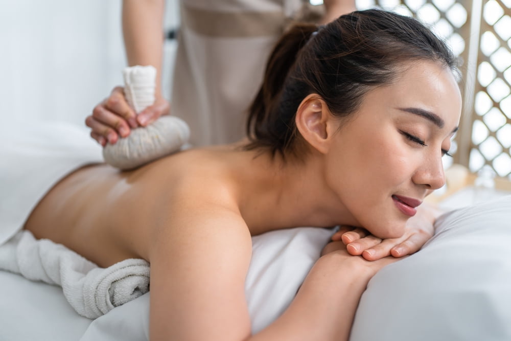Traditional Thai massage in Bangkok, a popular wellness experience for adult visitors