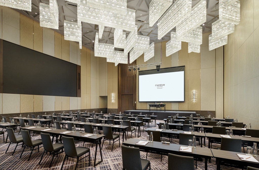 A meeting room set up for a corporate town hall meeting at Chatrium Grand Bangkok.