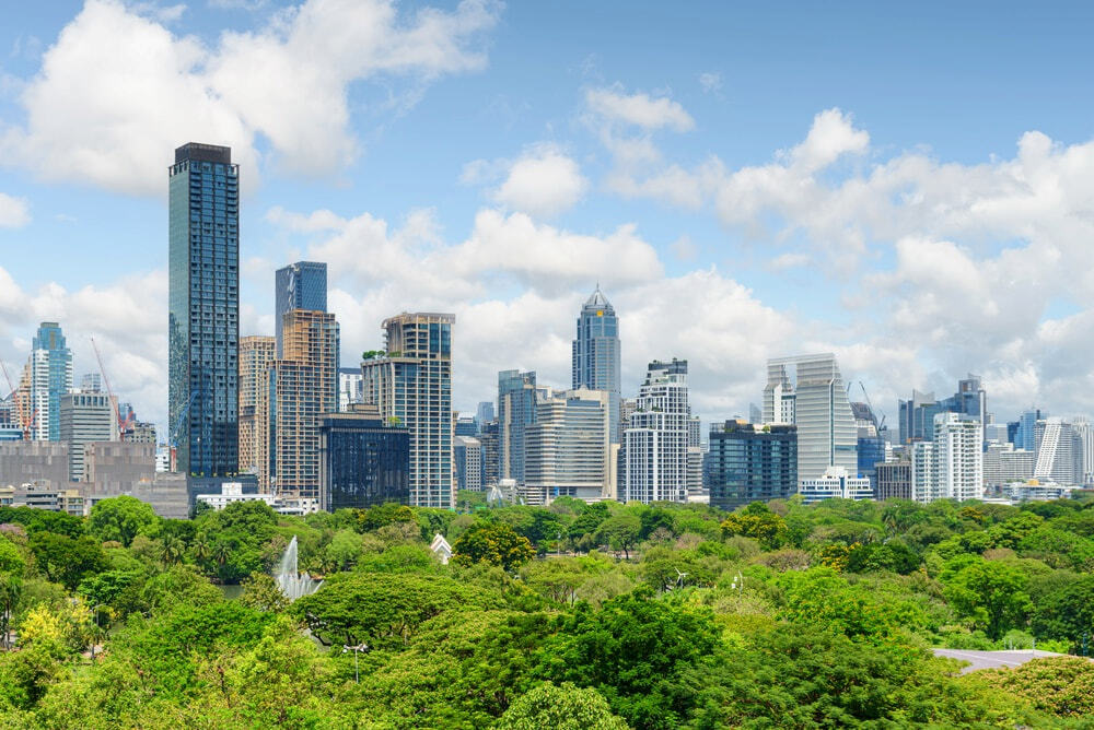 Bangkok city skyline with Lumpini Park in the foreground