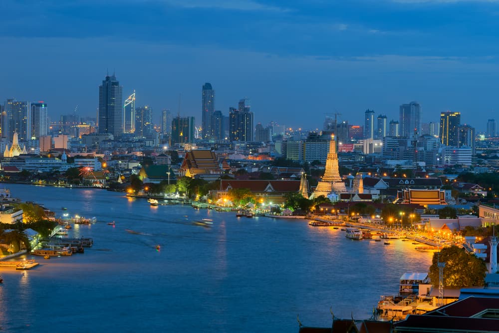 Chao Phraya riverside at night, a stunning backdrop for planning a wedding in Bangkok