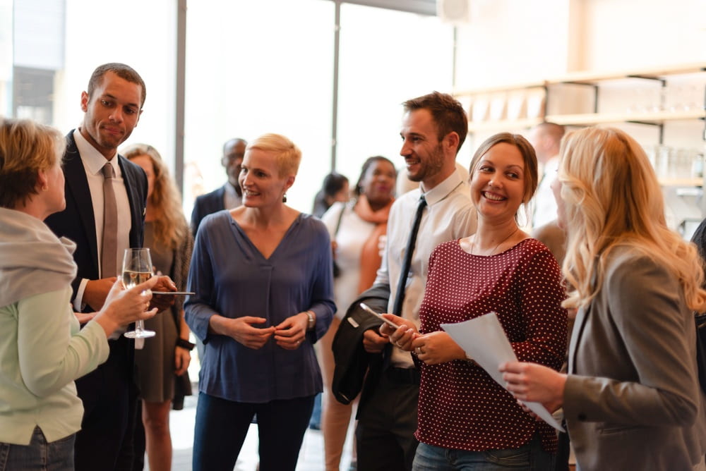 Guests enjoying a product launch event at an exclusive riverside event space Bangkok