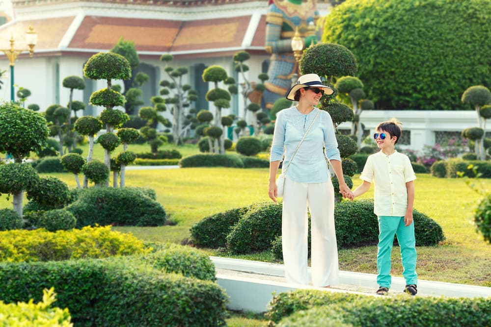 at templeFamily exploring a temple in Bangkok, a top Bangkok riverside family activity