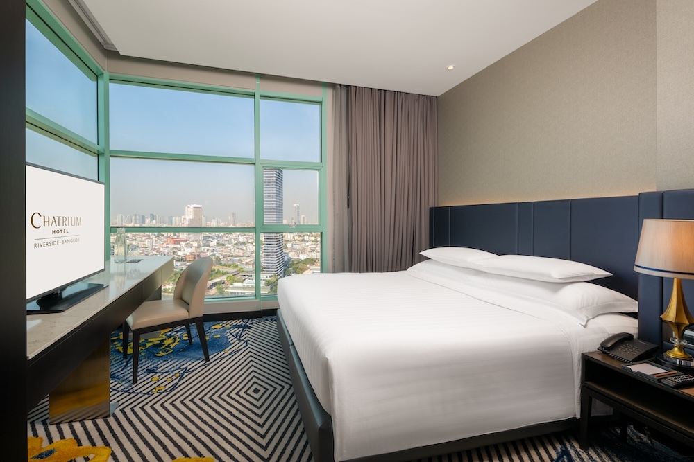 A one-bedroom skyline suite at Chatrium Residence Riverside Bangkok