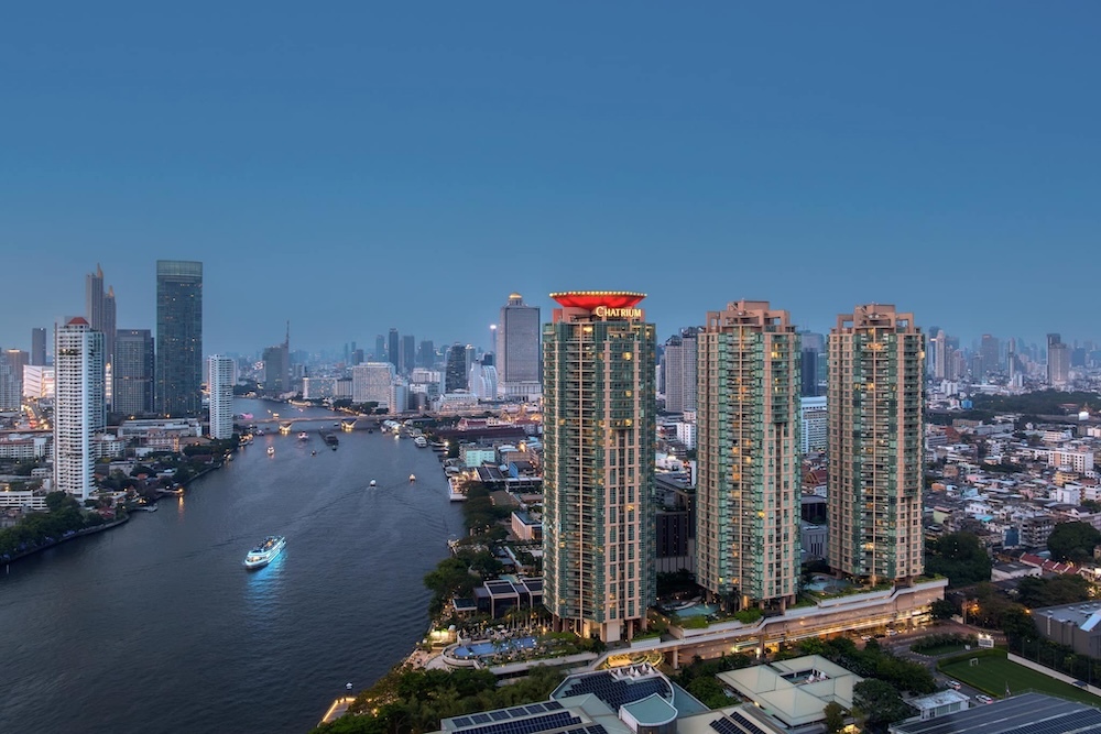 Riverside exterior of a five-star residence hotel near the Chao Phraya River in Bangkok