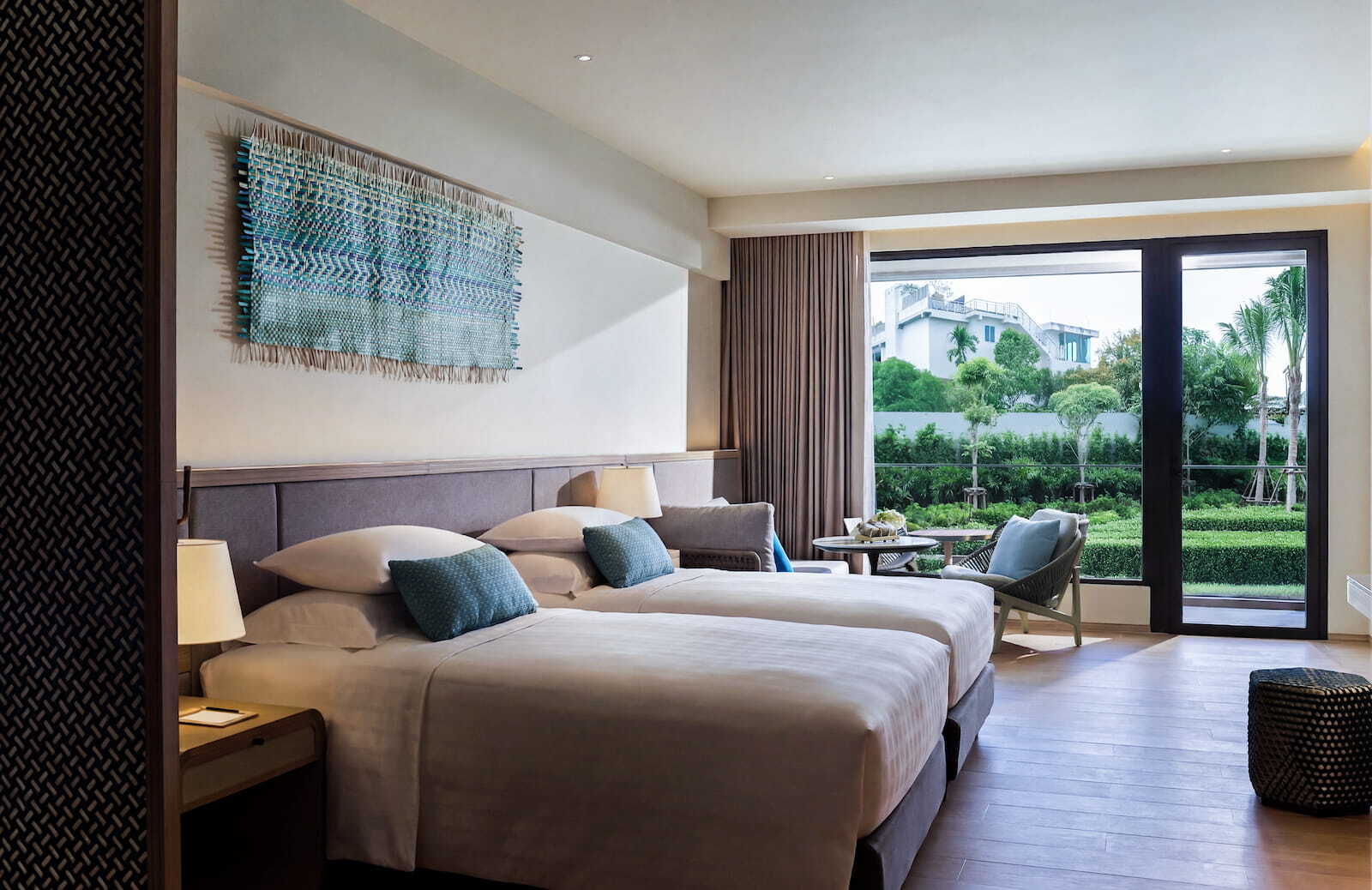 Nemita Grand Wellness Deluxe at Chatrium Rawai Phuket with calming interiors.