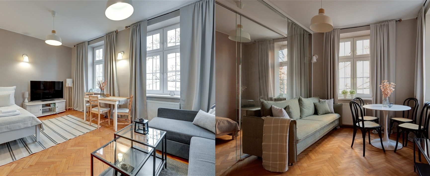 Jasne studio z łóżkiem podwójnym, szarą sofą, telewizorem, szklanym stolikiem, okrągłym stołem, dużymi oknami i parkietem