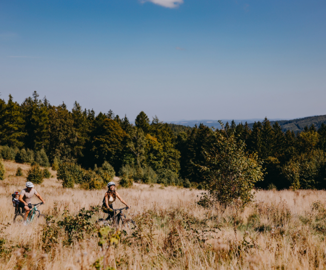 Couple with child on bike trip