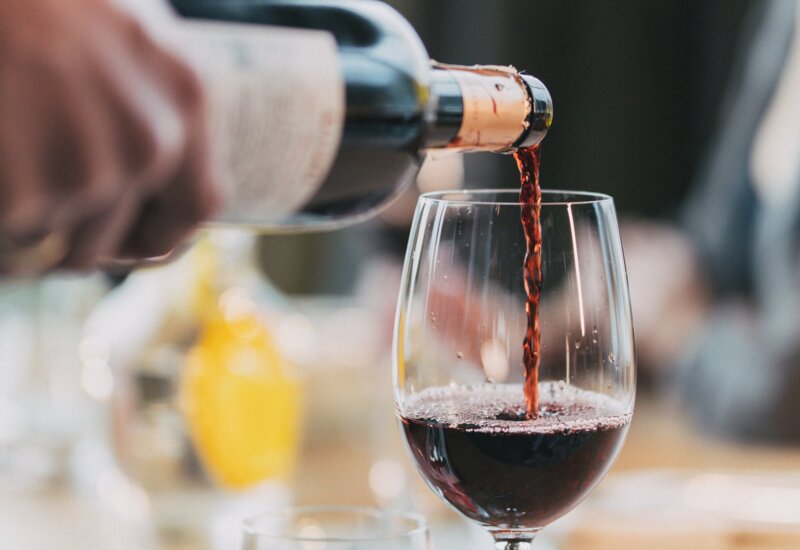 pouring wine into a glass