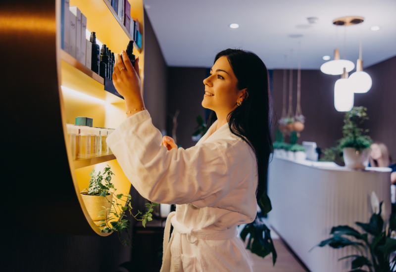 Woman choosing cosmetics for treatment