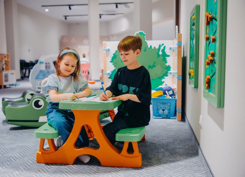 Children drawing in playroom