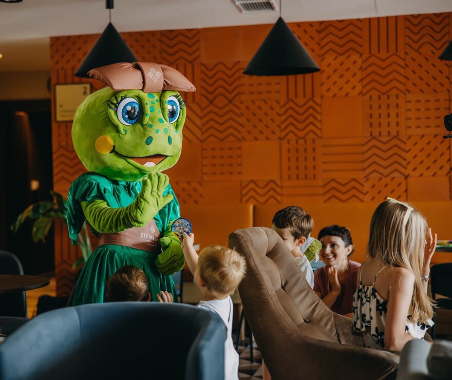 Hotel mascot with children