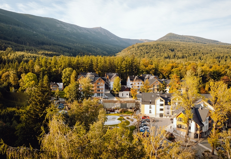 Sunny aerial view of Green Mountain properties—apartments & hotel in Karpacz at the foot of the