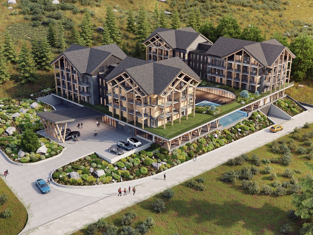 Ośrodek w stylu chalet z drewnianymi budynkami, balkonami, zielonym dachem, basenem zewnętrznym i zadaszonym podjazdem