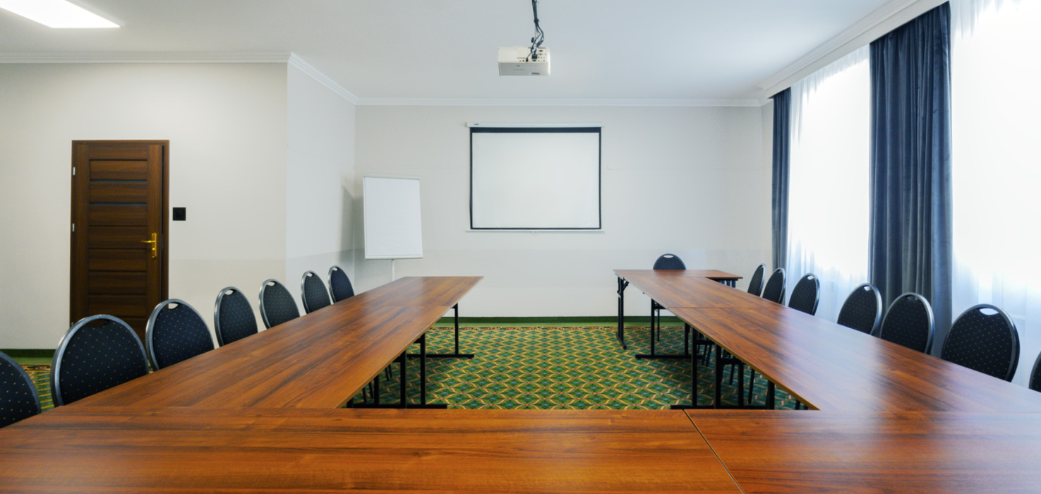 Conference room B in horseshoe setting prepared for training