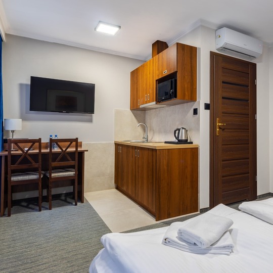 Studio with air conditioning and kitchenette at Hit Hotel