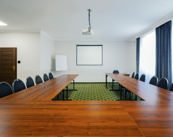 Conference room B in horseshoe setting prepared for training