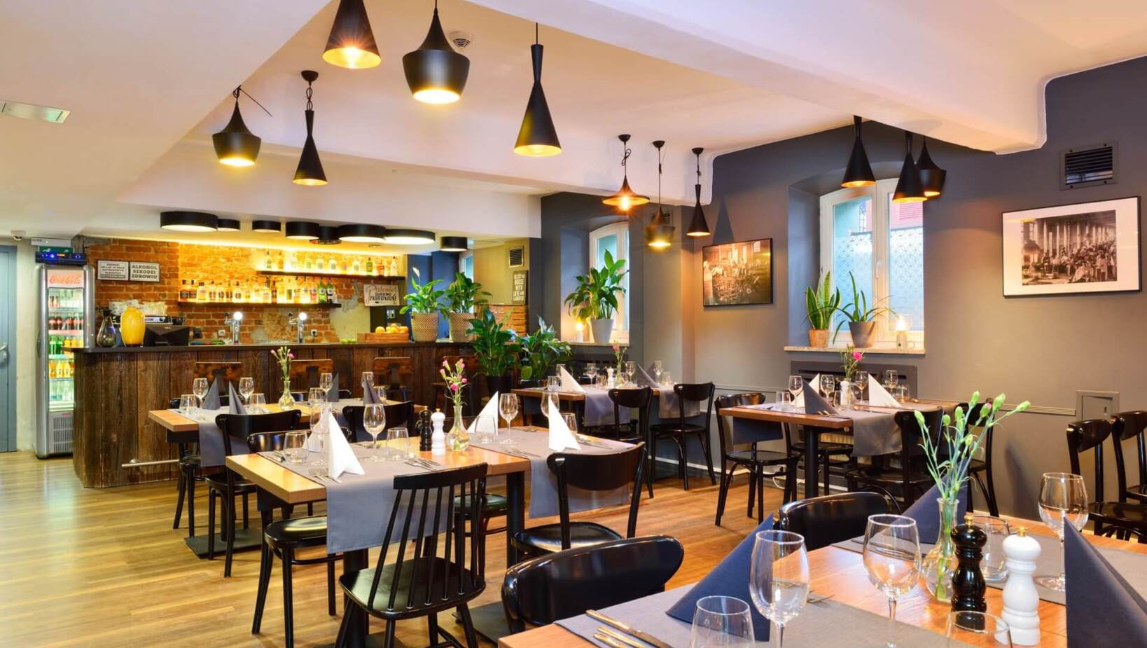 Warm interior of Kretschmer’s restaurant with set tables ready for guests