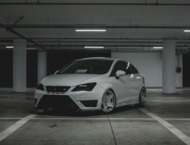 A car parked in a designated private parking area for hotel guests