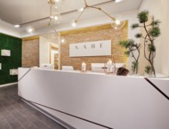 A modern, elegant entrance to the spa reception in the wellness area of the Nosalowy Dwór hotel