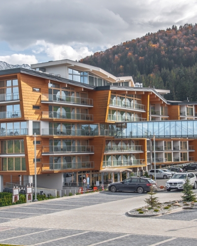 A modern resort with a view of the mountain panorama