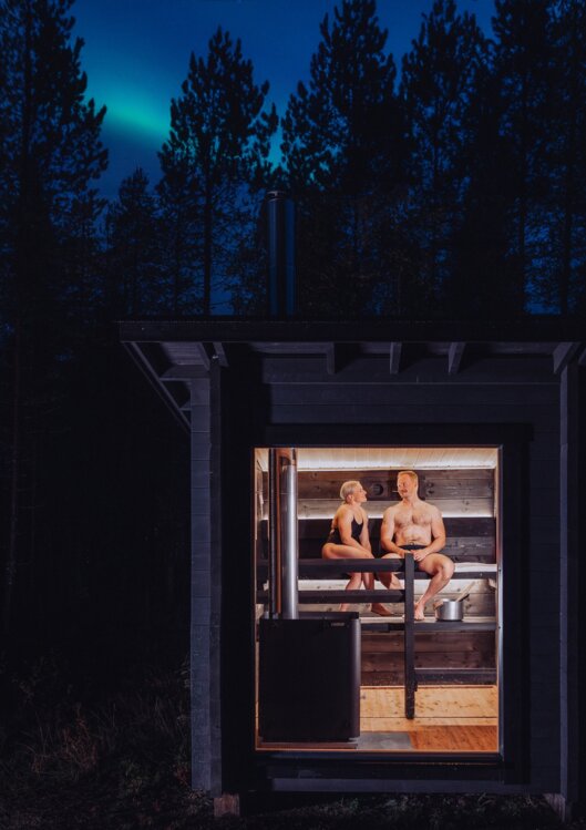 A couple enjoying an sauna experience at Nova Galaxy Village