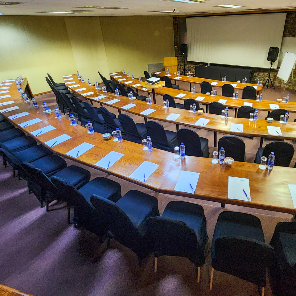 Conference venue at The Venue Country Hotel & Spa near Hartbeespoort, featuring a professional meeting setup with seating, presentation facilities, and flexible space for corporate events, business meetings, training sessions, workshops, and private functions along the scenic R512 route.
