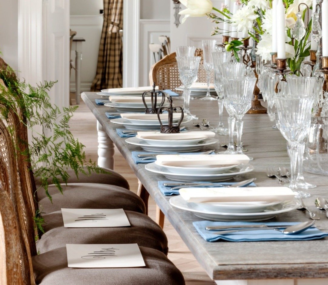 The living room for family parties in the Kamieniec Palace. A large wooden table and tableware,
