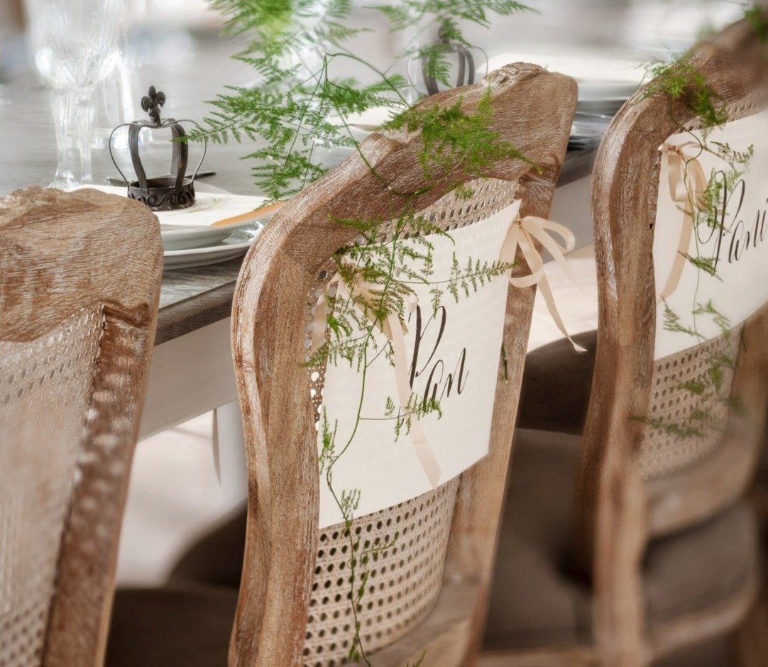 The living room for family parties in the Kamieniec Palace. A large wooden table and tableware.