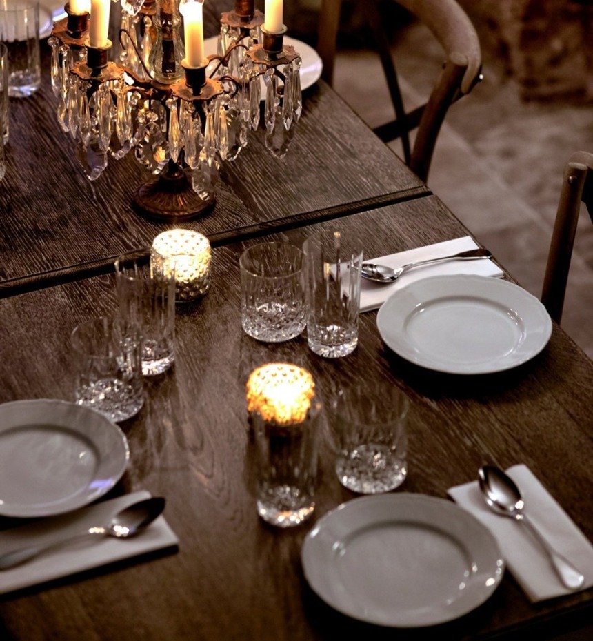 Table decoration. Crystal candelabra. A table in the Pałac Kamieniec Restaurant. Candles