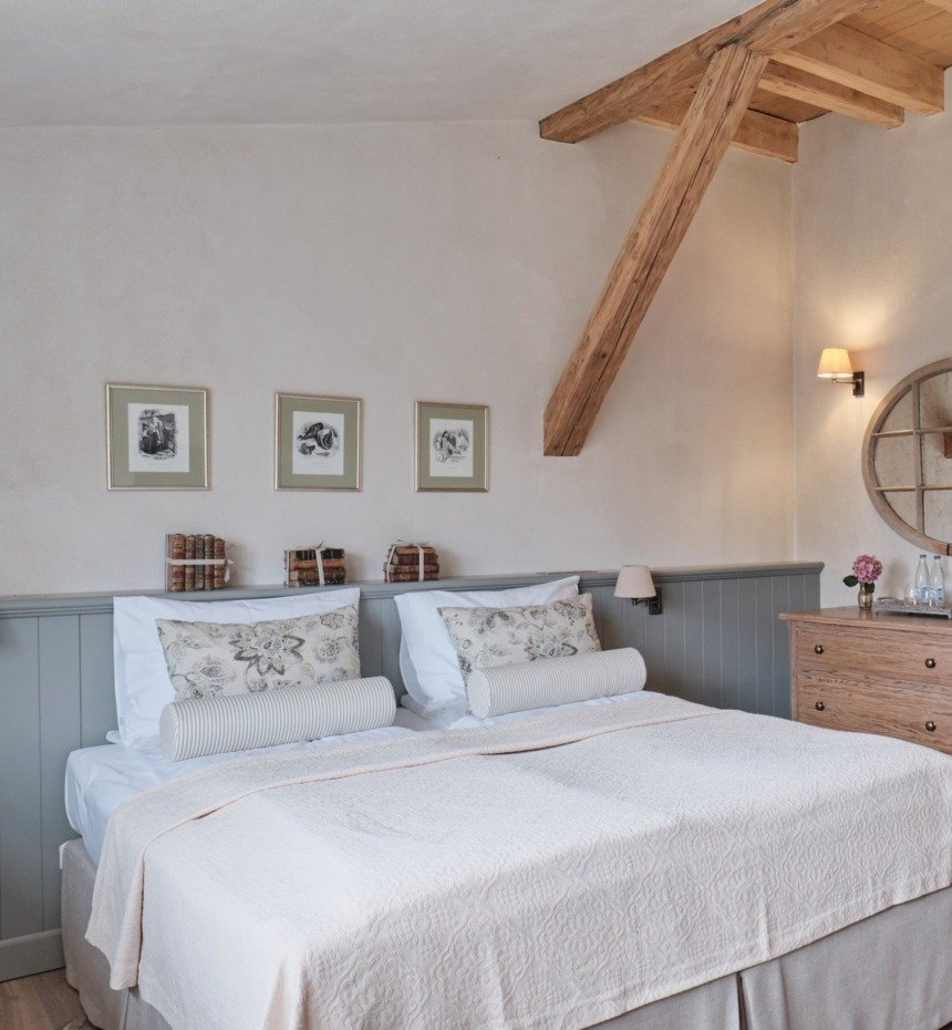 Standard room in Grange. Comfortable large bed. Nice interior design. A room in the Kamieniec Palac