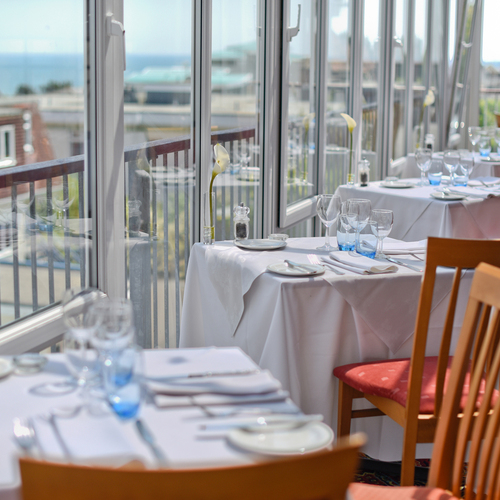 Hotel restaurant with sea views serving full English breakfast and delicious dinners