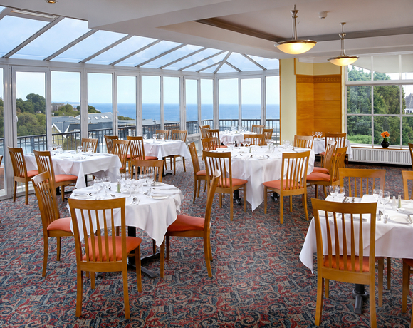 Hotel restaurant with sea views serving full English breakfast and delicious dinners