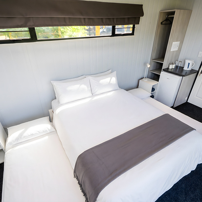 Family Room Unit with Queen Bed & Pull-Outs for Kids