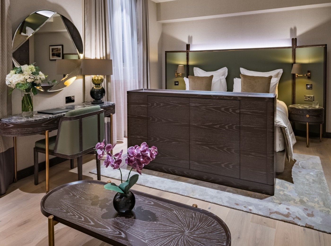 king size bed, a table, a desk by the wall